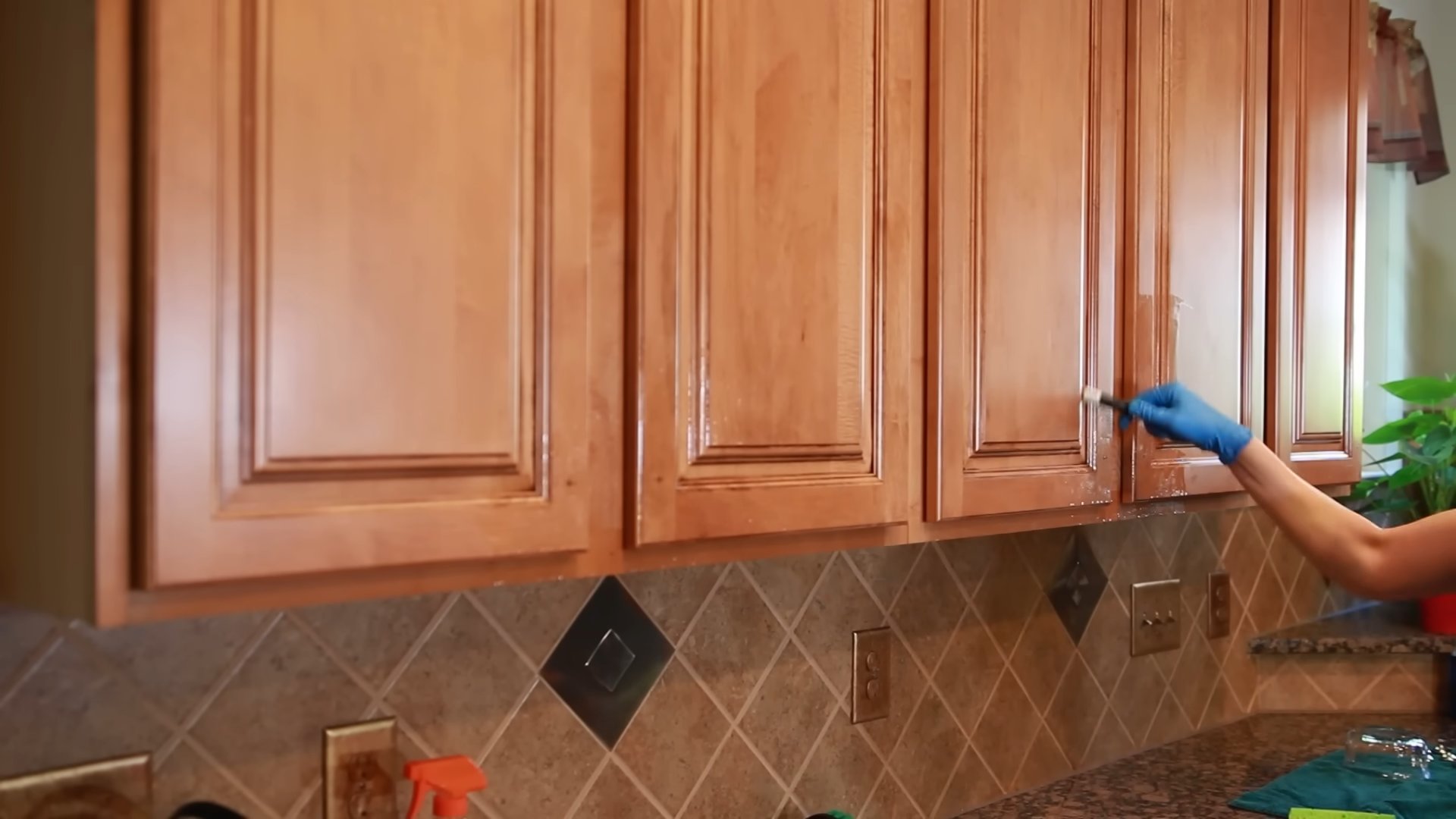 Clean sticky kitchen cabinets